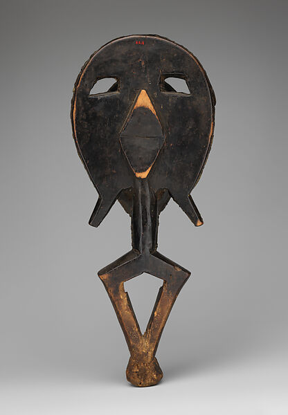 Sculptural Element from a Reliquary Ensemble, Obamba-Kota artist, Wood, brass sheets, brass and copper sheet-wire filaments, bone, brass nails, iron nails, Kota peoples, Obamba group