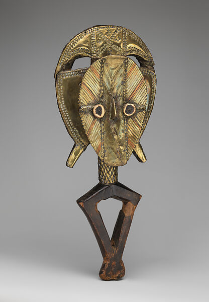 Sculptural Element from a Reliquary Ensemble, Obamba-Kota artist, Wood, brass sheets, brass and copper sheet-wire filaments, bone, brass nails, iron nails, Kota peoples, Obamba group