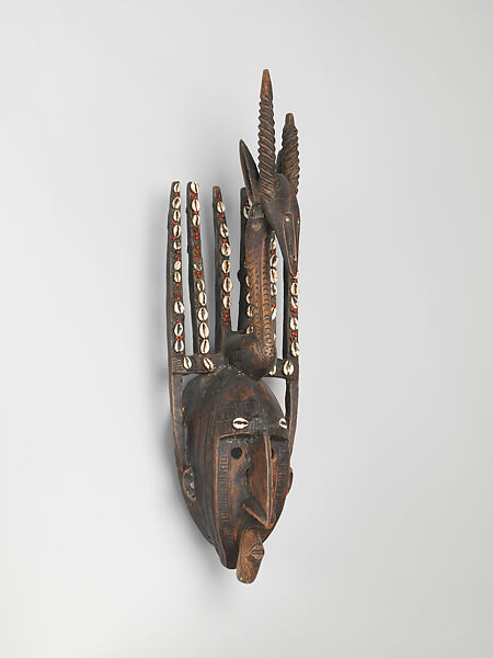 Mask: Antelope Figure (Ntomo), Wood, pigment, cowrie shells, seeds, latex, metal, Bamana peoples 