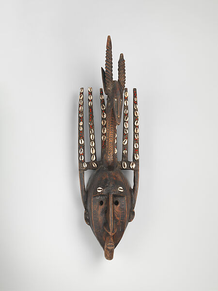 Mask: Antelope Figure (Ntomo), Wood, pigment, cowrie shells, seeds, latex, metal, Bamana peoples