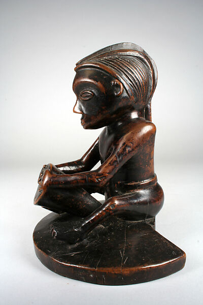 Figure: Seated Drummer (Mbundi-Ngoma), Wood, Mbala peoples 