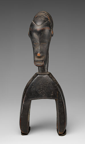 Heddle pulley with female figure