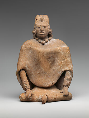 Seated female figure
