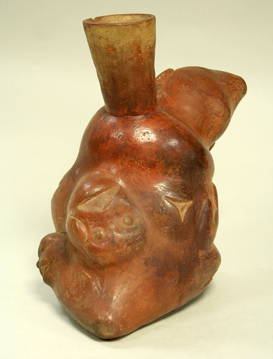 Tuber-inspired stirrup-spout bottle with monkeys, Moche artist(s), Ceramic, slip, Moche