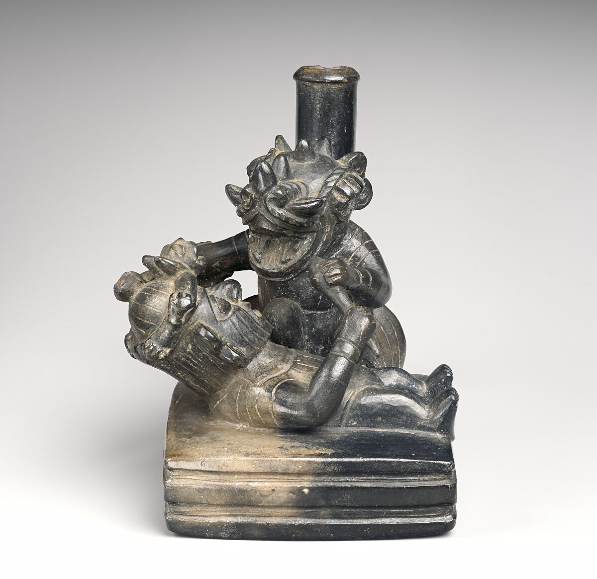 Stirrup-spout bottle with combat scene, Moche artist, Ceramic, Moche