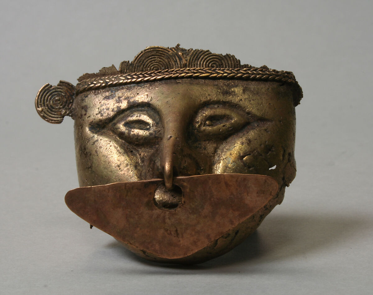 Anthropomorphic head pendant, Gold, Zenú 