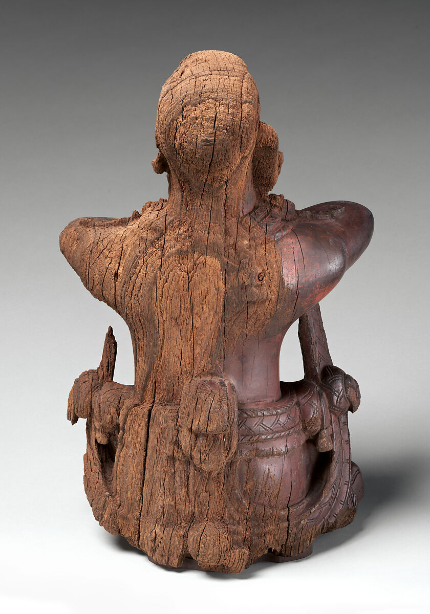 Mirror-bearer, Maya artist(s), Cordia wood (bocote), red hematite, Maya