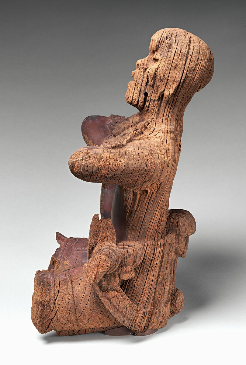 Mirror-bearer, Maya artist(s), Cordia wood (bocote), red hematite, Maya