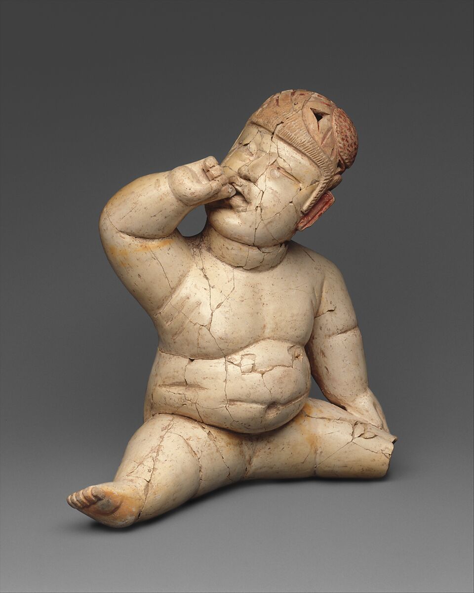 Seated hollow figure with helmet, Las Bocas artist(s), Ceramic, cinnabar, red ochre, Olmec