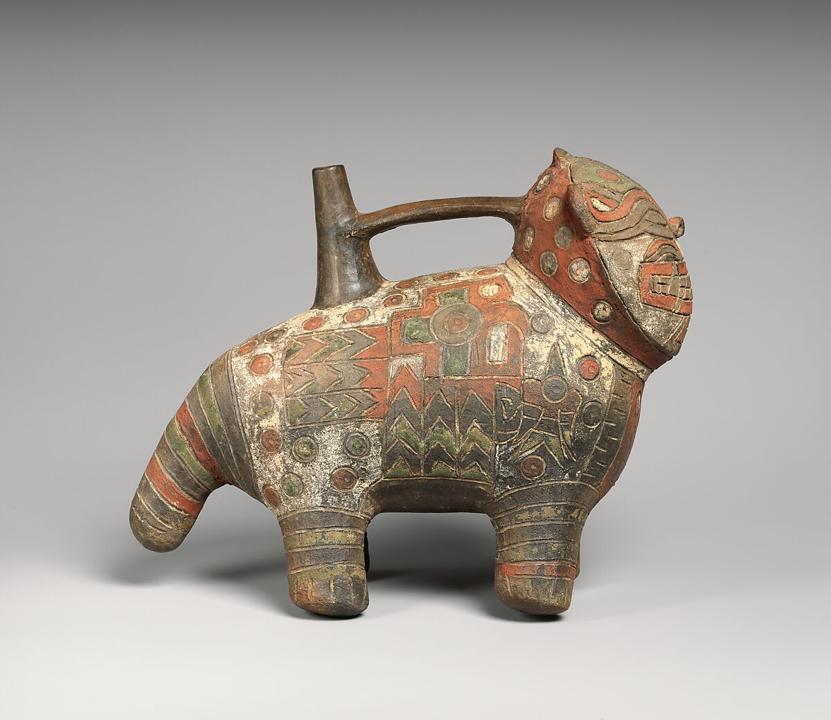 Feline-shaped spout-and-bridge bottle, Paracas artist(s), Ceramic, post-fire paint, Paracas