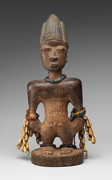 Ibeji Twin Figure, Wood, camwood powder, brass, glass beads, cowries, blueing, string, Yoruba peoples, Oyo group 
