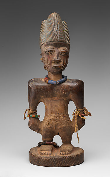 Twin Figure: Male (Ibeji), Wood, camwood powder, brass, glass beads, cowries, blueing, string, Yoruba peoples, Oyo group 