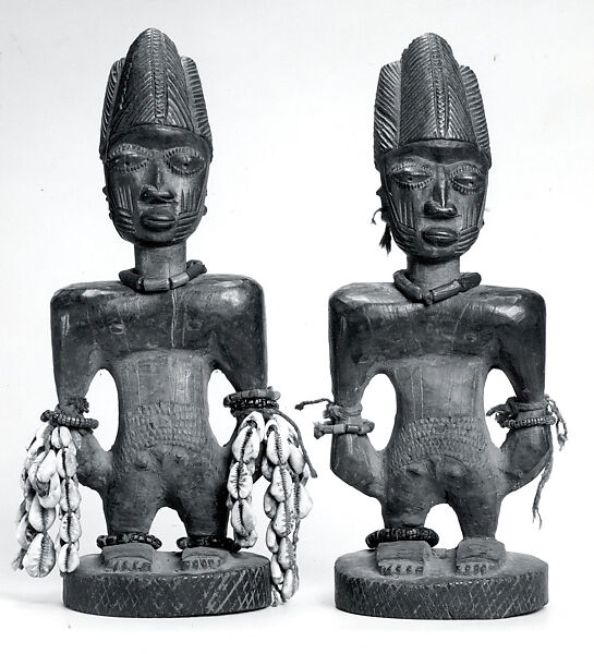 Twin Figure: Male (Ibeji), Oyo-Yoruba artist, Wood, camwood powder, brass, glass beads, cowries, blueing, string, Oyo-Yoruba peoples