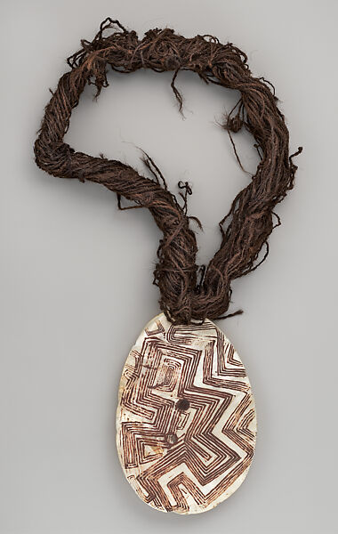 Engraved pearl shell and hair-string belt (riji, or jakoli, longkalongka), Pearl shell, human hair, ocher, Western Kimberley 