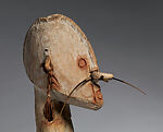 Male ancestor figure, Asmat artist, Wood, paint, sago palm leaves, fibers, mulberry fiber, pig tusk, cassowary quills, hair, coix seed, Asmat people