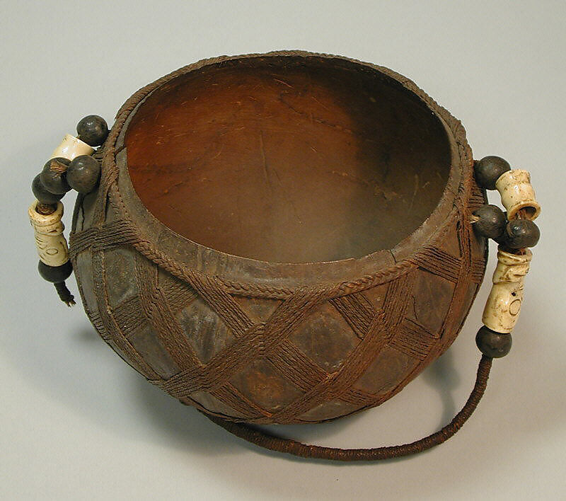 Suspended Bowl, Coconut shell, bone, seeds, fiber, Marquesan (Enata) people 