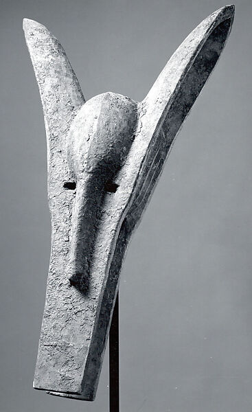 Kònò Helmet Mask, Bamana numu (blacksmith), Wood, sacrificial patina, Bamana peoples