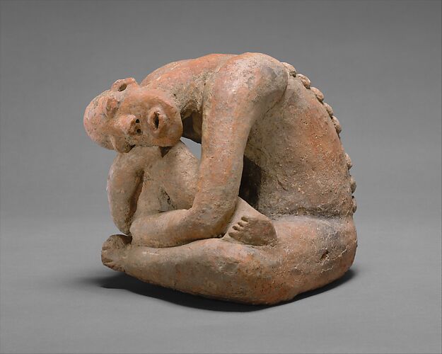 Seated figure