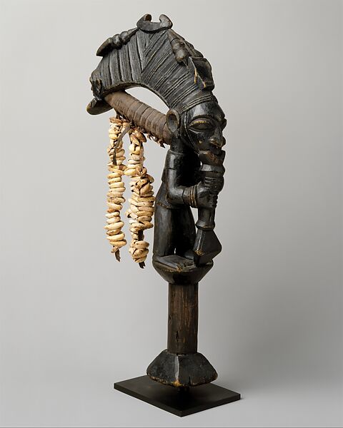 Esu Staff (Ogo Elegba), Moshood Olusomo Bámigbóyè (Nigerian, Ekiti region, Odo Owa ca. 1885–1975 Odo Owa), Wood, cowrie shells, hide, Yoruba peoples, Ekiti group 