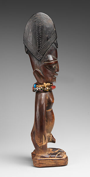Twin Figure: Male (Ibeji), Igbomina-Yoruba artist, Wood, beads, metal, camwood powder, indigo, Igbomina-Yoruba peoples