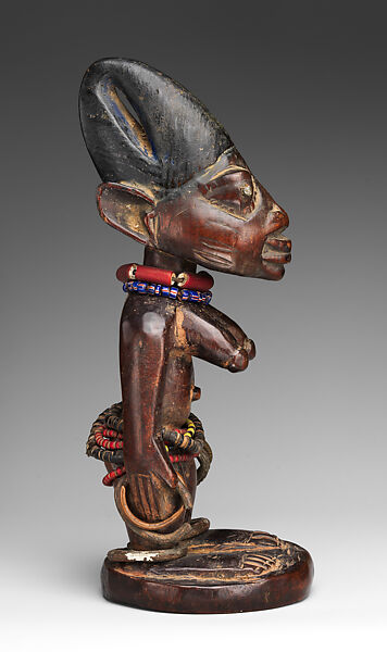 Twin Figure: Female (Ibeji), Yoruba artist, Wood, camwood powder, beads, metal, blueing, Yoruba peoples