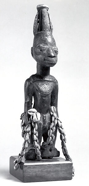 Twin Figure: Male (Ibeji), Workshop of Agbonbiofe  , possibly, Wood, camwood powder, nails, cowries, string, Yoruba peoples, Ekiti group 