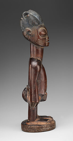 Twin Figure: Female (Ibeji), Oyo-Yoruba artist, Wood, indigo, camwood powder, Oyo-Yoruba peoples