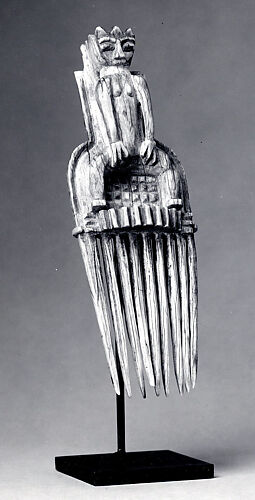 Comb with Female Figure