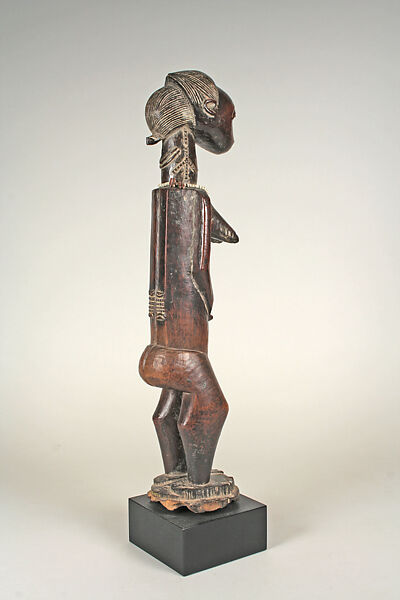 Female Figure, Wood, pigment, plant fiber, glass beads, Baule peoples