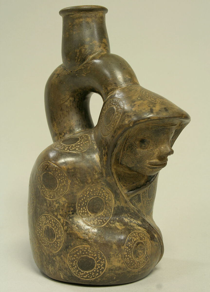 Stirrup Spout Bottle; Kneeling Figure, Ceramic, pigment, Cupisnique 
