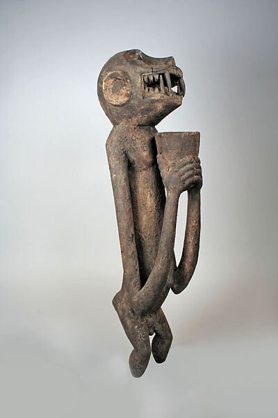 Monkey Figure for Mbra, Wood, sacrificial materials, Baule peoples 