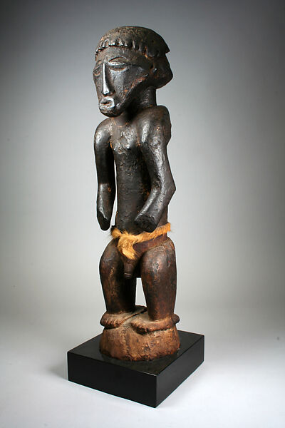 Figure: Male, Wood, hide with fur, sacrificial materials, wax, Bembe peoples, Kasingo group 