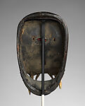 Kagle face mask, Dan artist, Wood, brass tacks, nails, dried mud, animal teeth, hair, and paint, Dan peoples