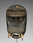 Kagle face mask, Dan artist, Wood, brass tacks, nails, dried mud, animal teeth, hair, and paint, Dan peoples