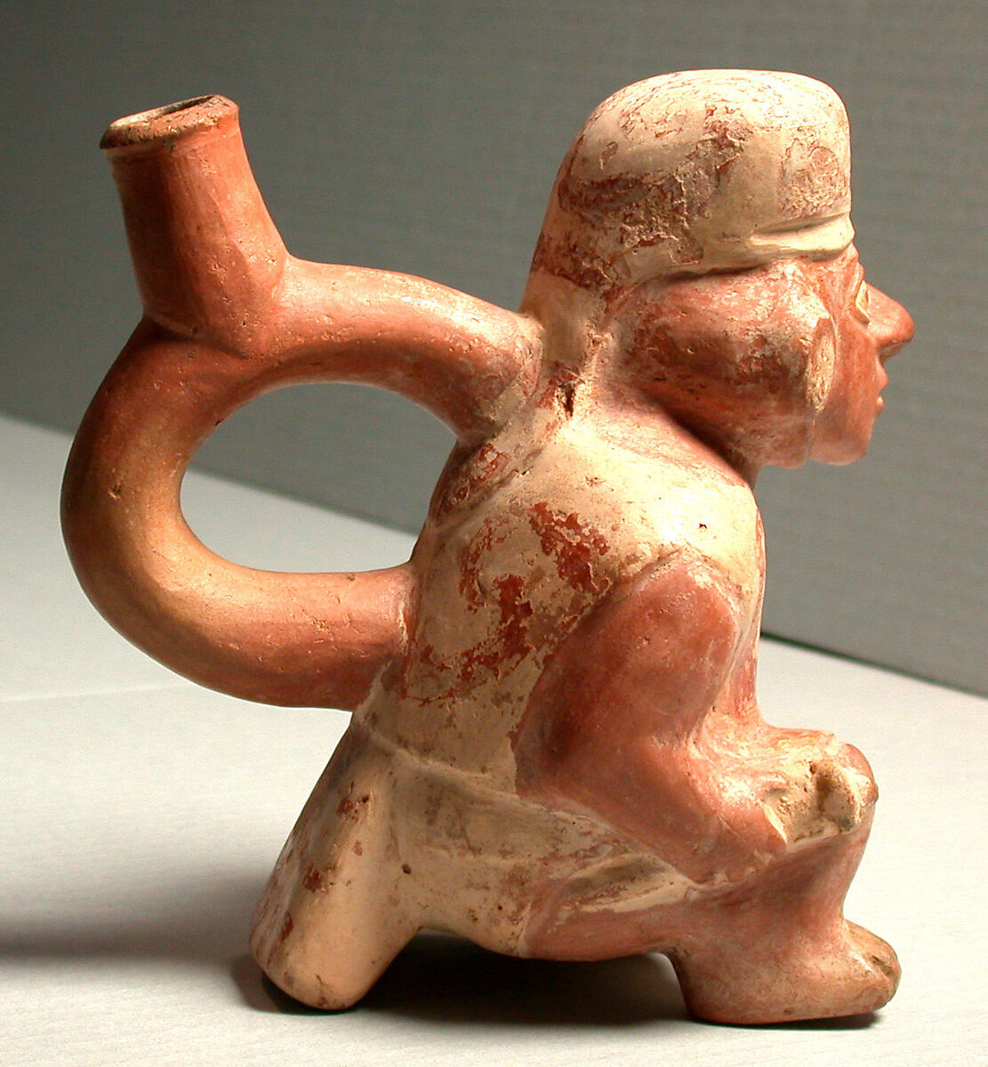 Stirrup Spout Bottle with Warrior, Ceramic, slip, Moche