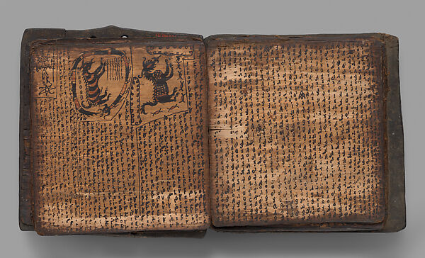 Pustaha (book of ritual knowledge), Toba Batak artist, Wood, bast, resin ink, fiber, Toba Batak people