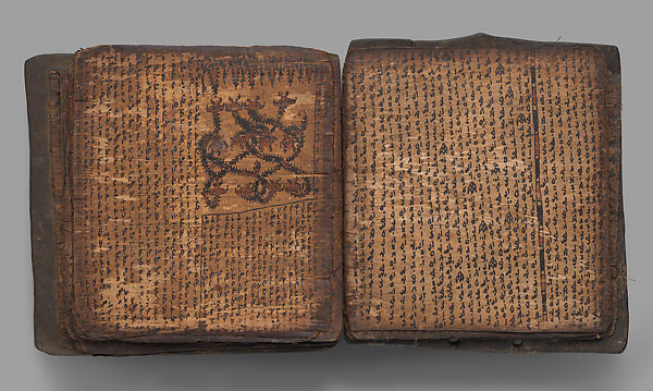 Pustaha (book of ritual knowledge), Toba Batak artist, Wood, bast, resin ink, fiber, Toba Batak people