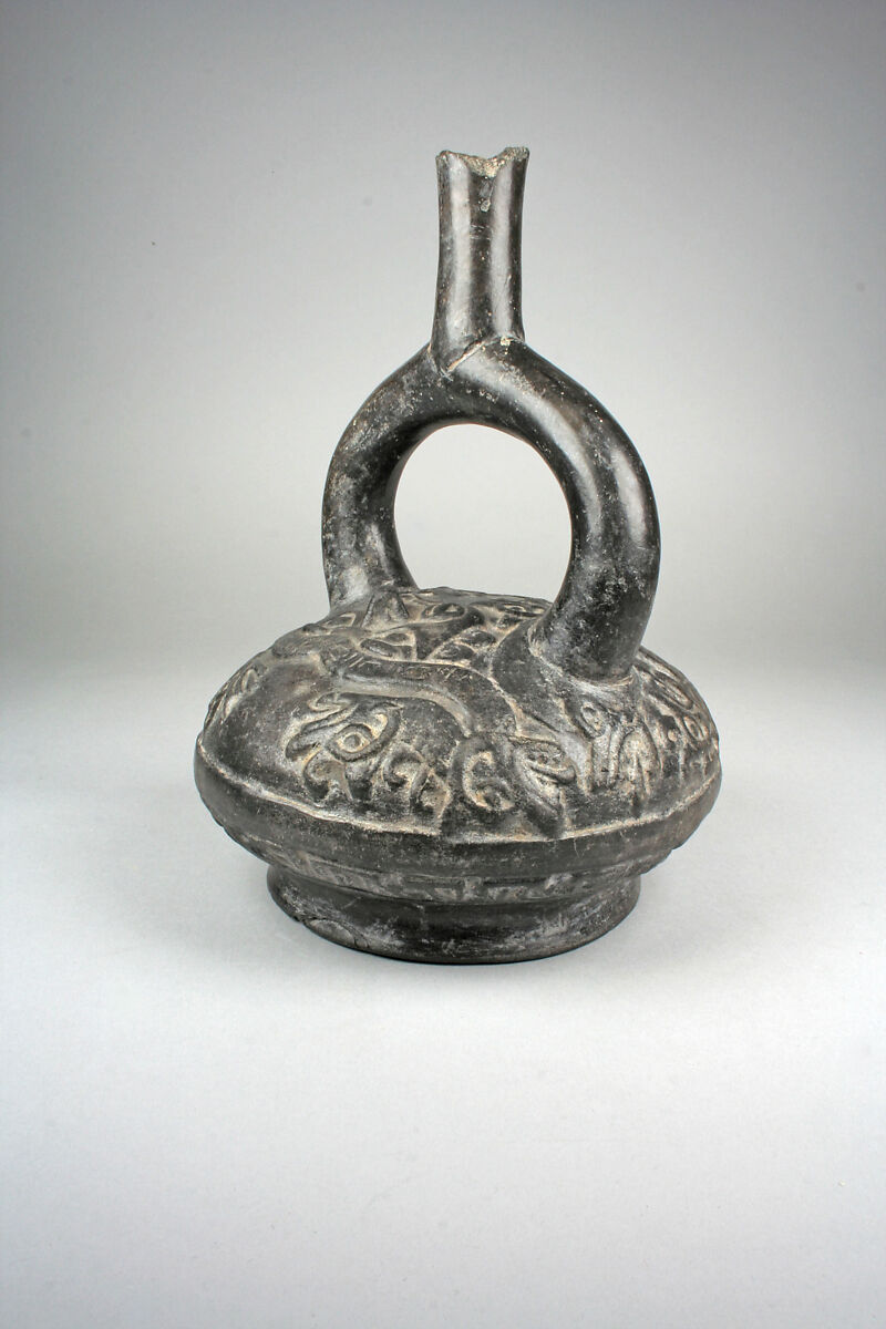 Stirrup Spout Bottle with Fanged Deity, Ceramic, slip, Moche 