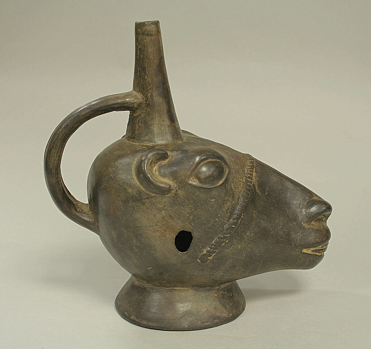 Stirrup Spout Bottle with Llama Head, Ceramic, Chimú