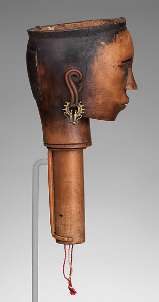 Si gale-gale (puppet head), Toba Batak artist(s), Wood, brass lead, water buffalo horn, paint, Toba Batak