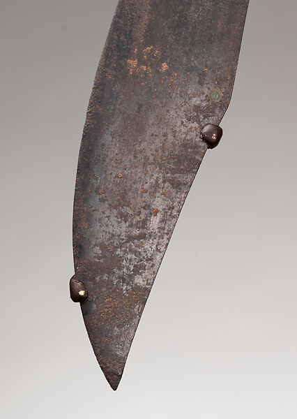 Piso sanalenggam (sword), Toba Batak artist, Water buffalo horn, copper/zinc alloy (sun inlay and end of the handle), lead (necklace and eyes of the handle figure), iron alloy, Toba Batak
