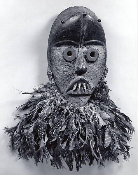 Face Mask, Wood, feathers, cotton, thread, fiber, iron, animal teeth, sacrificial materials, Dan peoples 