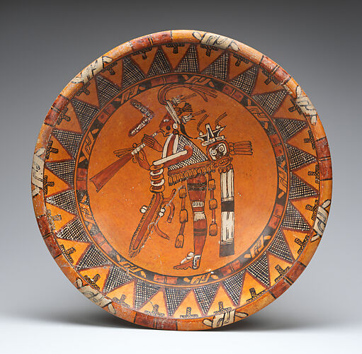 Plate with trumpeter