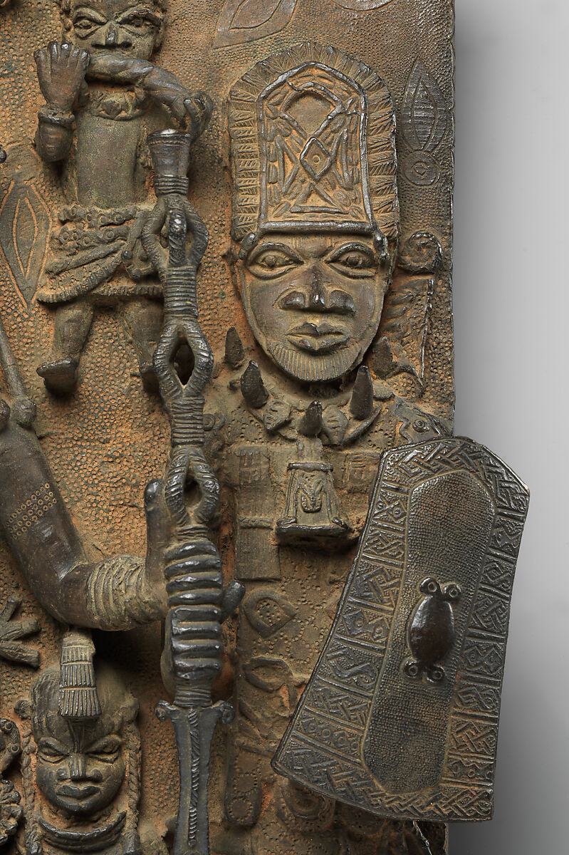 Plaque with Warrior and Attendants, Ìgùn Ẹ́rọ̀nwwọ̀n (brass-casting guild) artists, Brass, Edo peoples