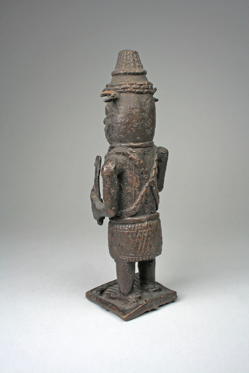 Figure: Court Official with Hammer and Staff, Ìgùn Ẹ́rọ̀nwwọ̀n (brass-casting guild) artists, Brass, Edo peoples