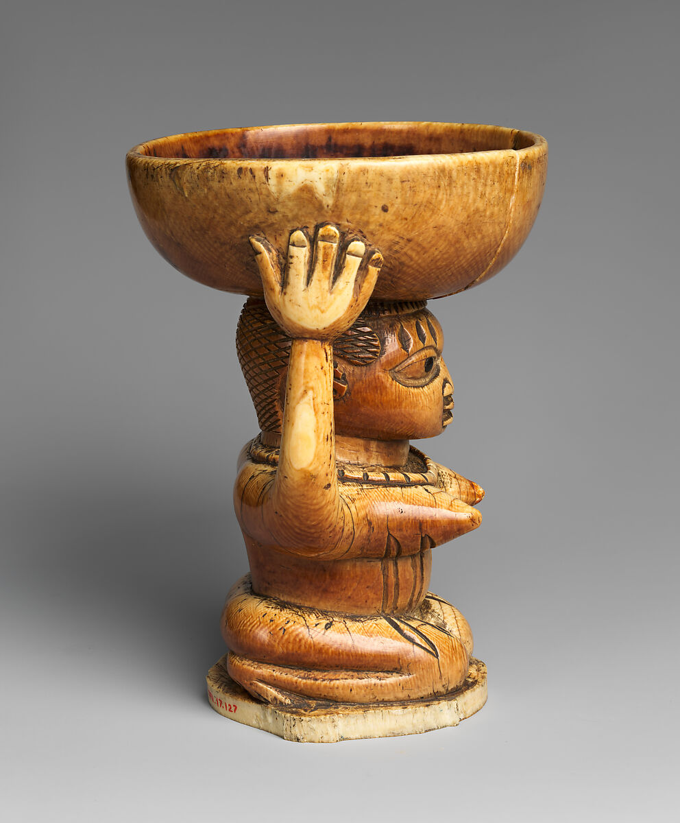 Àgéré Ifá (Ifá divination vessel) with kneeling woman, Yoruba artist, Ivory, wood or coconut shell inlay, Yoruba peoples, Owo group
