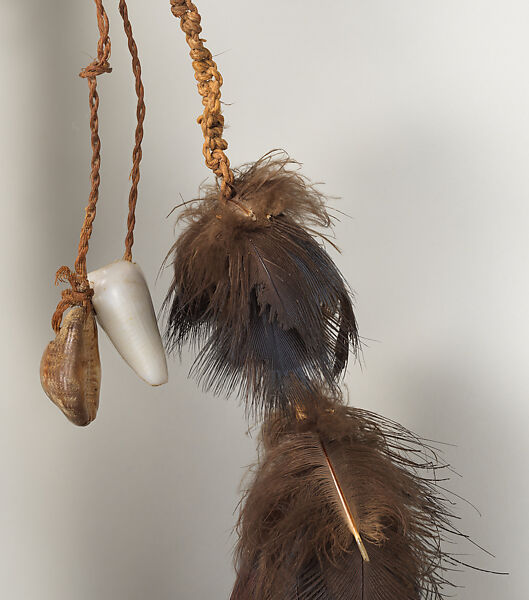 Dagger, Cassowary bone, feathers, shells, tradecloth, feathers, fiber, plastic beads, Mensuat region (?)