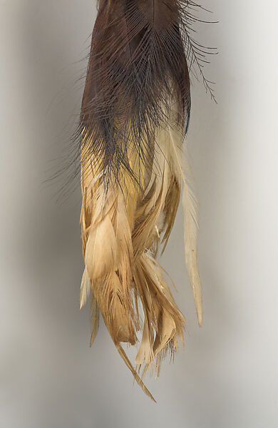 Dagger, Cassowary bone, feathers, shells, tradecloth, feathers, fiber, plastic beads, Mensuat region (?)