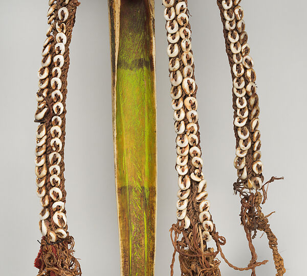 Dagger, Cassowary bone, feathers, shells, tradecloth, feathers, fiber, plastic beads, Mensuat region (?)