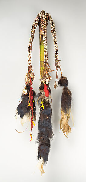 Dagger, Cassowary bone, feathers, shells, tradecloth, feathers, fiber, plastic beads, Mensuat region (?)